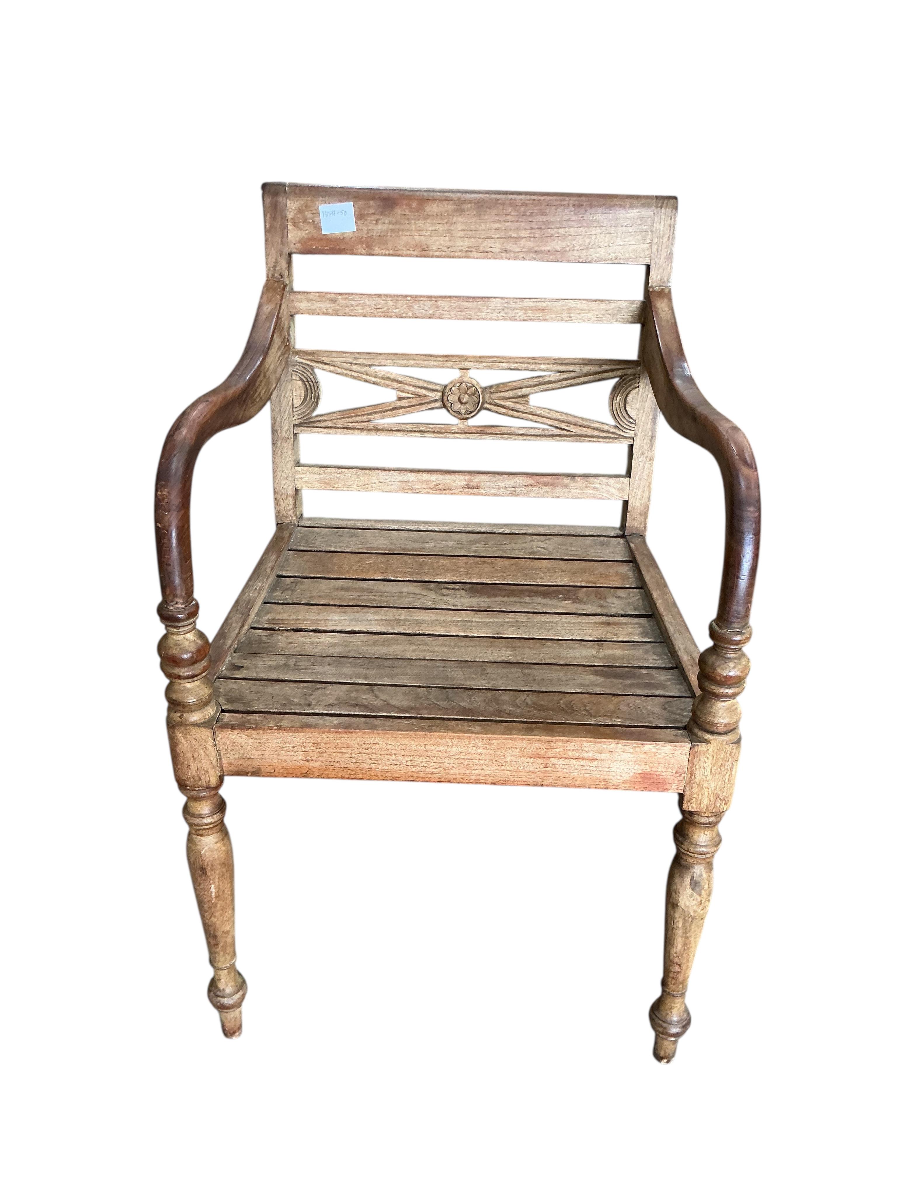 An Anglo-Indian hardwood elbow chair, width 53cm, height 84cm